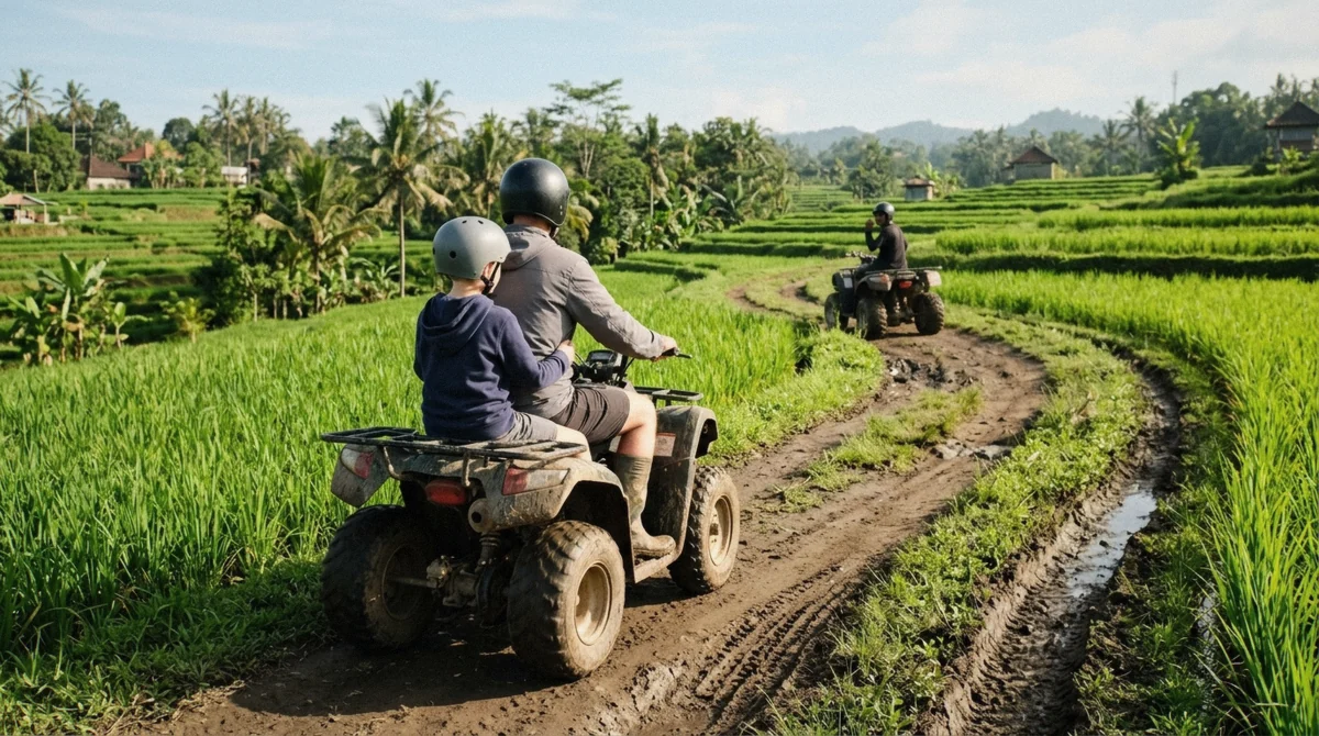 A parent and child riding tandem on a muddy jungle track during an ATV Bali tour with kids near Ubud
